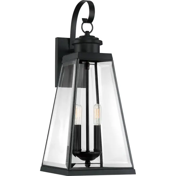 Illuminate your home's exterior with the Paxton collection. Sleek lines and a tapered silhouette combine to make a timeless statement that is simple, yet stylish. Constructed with clear beveled glass and a matte black finish, these fixtures are built to last.