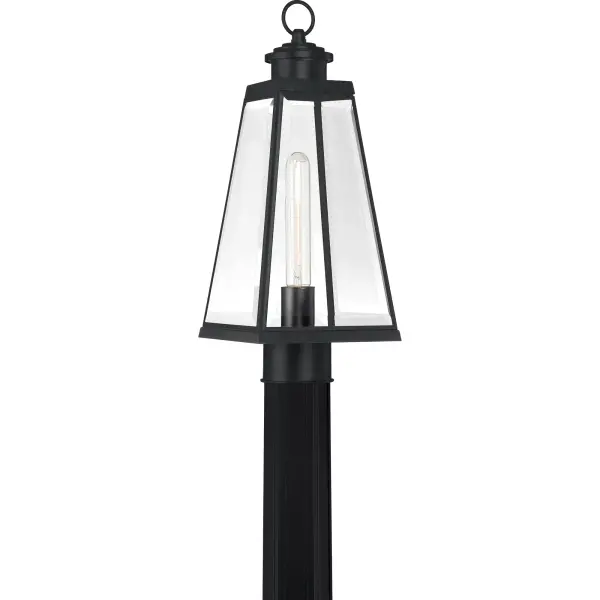 Illuminate your home's exterior with the Paxton collection. Sleek lines and a tapered silhouette combine to make a timeless statement that is simple, yet stylish. Constructed with clear beveled glass and a matte black finish, these fixtures are built to last.