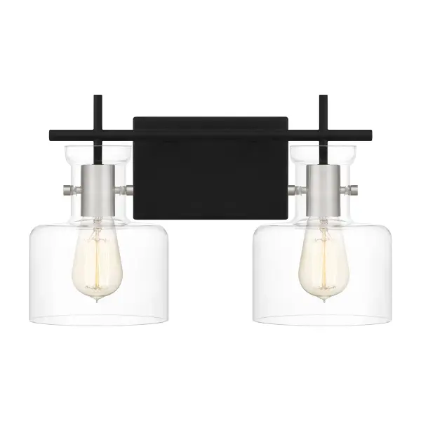 A matte black finish includes a hint of shine, courtesy of brushed aluminum accents, in the Pensbury bath light. With clear glass shades to maximize radiance, the light comes in either three or four bulbs. The black-and-silver colorway adds a refined touch to modern bath spaces.