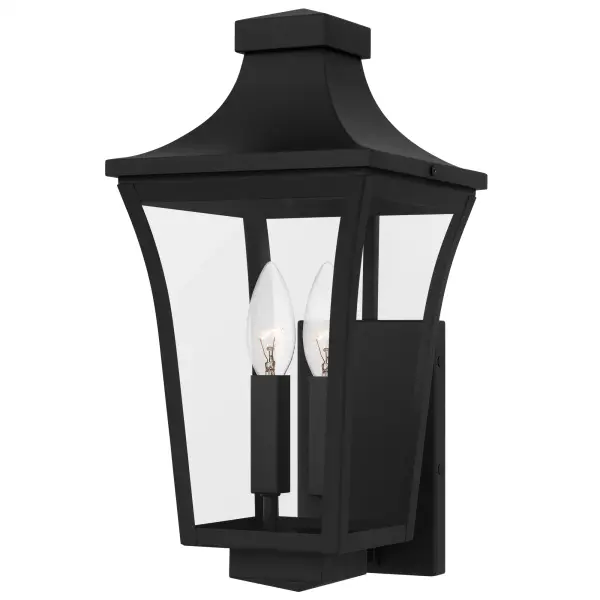 The Quentin outdoor lantern collection offers a traditional design that complements a variety of exteriors. The tapered frame is finished in a classic earth black finish. Clear glass panels allow the natural beauty of the bulb to shine through, providing a warm and inviting glow for your entryway, porch, or patio. Quentin is available in a complete collection, allowing you to create a cohesive look throughout your entire outdoor space. Choose from hanging lantern, multiple sizes of wall lantern, or post lantern head.
