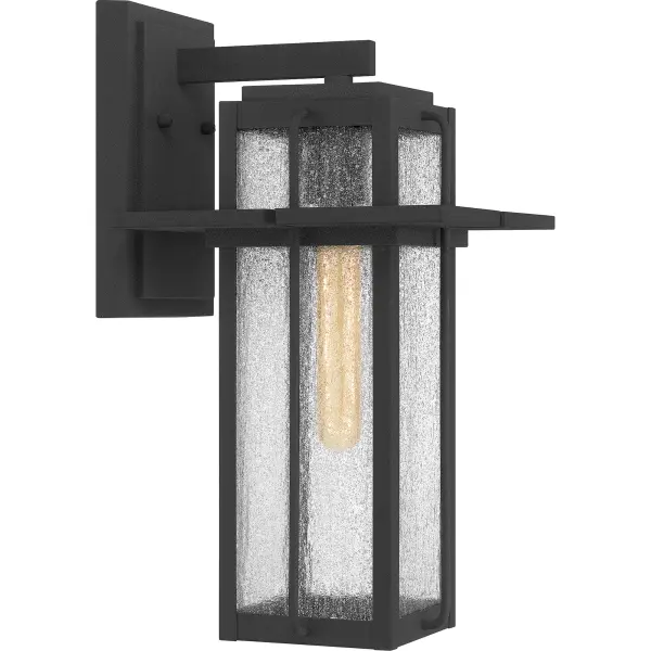 Create a lasting impression with the Randall collection of outdoor lanterns. Clear seeded glass panels are enclosed in a classic rectangular Mottled Black frame, providing life-long style and durability.  Randall comes in many options including a hanging lantern, wall lanterns, and a post lantern to round out your home's exterior.