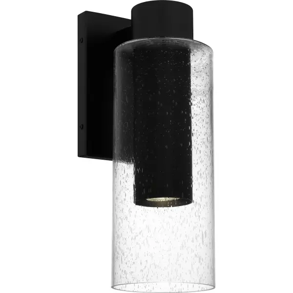 Elevate your home's exterior with the modern sophistication of Sawyer. Designed for both style and function, these outdoor wall lights feature a sleek matte black finish paired with clear seedy glass, creating a visually intriguing effect while providing soft, ambient illumination. Perfect for flanking your front door or illuminating your porch, Sawyer sconces are ideal for setting the stage for outdoor gatherings and enhancing curb appeal. Additionally, Sawyer lanterns are Dark Sky certified, ensuring that light is directed downward to reduce light pollution and support environmentally friend