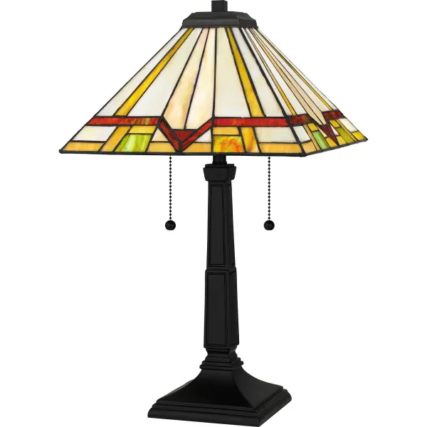 The Frederick table lamp features a matte black finish and handcrafted Tiffany glass in shades of warm honey amber, bisque, cream, and crimson. Each geometric piece of glass is hand assembled, creating a one-of-a-kind visual experience for your home. Illuminate your kitchen or living room, add style to a home office, or cozy up in your bedroom for some reading.