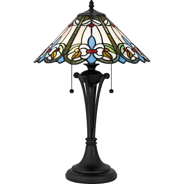 Add a touch of classic elegance to your space with the Giles table lamp. Handcrafted in the iconic Tiffany style, this lamp features a beautifully intricate multicolor glass shade in soothing hues of white, green, blue, and red. The vibrant glasswork creates a captivating play of light and color, making it a focal point in any room. The lamp’s sturdy resin base, finished in matte black, provides a modern contrast to the traditional glass shade, blending seamlessly with various decor styles.