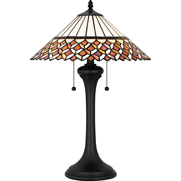 Illuminate your space with the Isla table lamp, a beautiful blend of classic Tiffany style and transitional design. Featuring intricate handcrafted glass in a timeless pattern, this lamp adds a touch of elegance and sophistication to any room. The matte black finish on the base contrasts beautifully with the colorful glass, creating a timeless look perfect for adding a sophisticated accent to your living room, study, or bedroom.