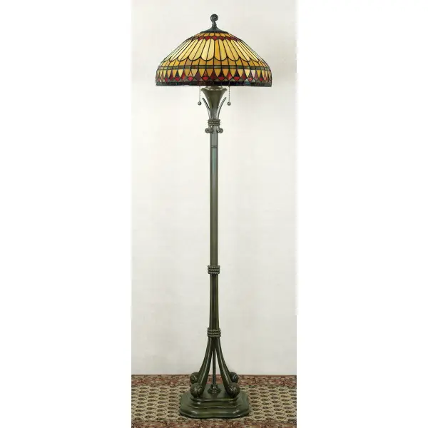 The earthy style of the West End Collection is a great way to bring the drama of Tiffany art glass into a more rustic or contemporary room setting.  The hand cut  iridescent art glass is arranged in a soft geometric pattern  and features the rich color palette of an Indian summer.  Simply breathtaking.Glass color in Tiffany lighting products vary in color.  No two pieces are identical.