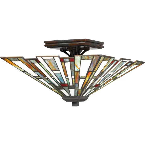 The Maybeck is a chic interpretation of timeless Tiffany style. The classic tapered silhouette features a staggered edge that emphasizes the intricate details of the Tiffany glass. Finished in valiant bronze, this stately collection is sure to add warmth and sophistication to your space.Glass color in Tiffany lighting products will vary. No two pieces are identical.