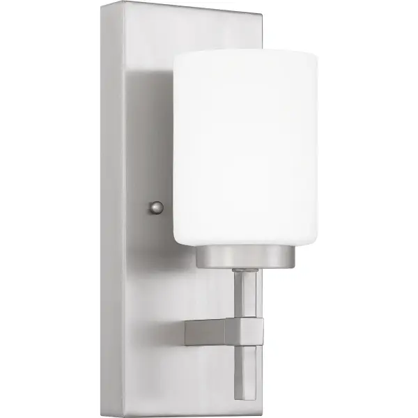 Opal etched glass casts a warm, ambient glow in the Wilburn wall sconce and bath light collection. The minimalist silhouette is accentuated by clean straight lines and a gleaming rectangular backplate. Choose from a variety of size and finish options to round out your home. Whichever you choose, Wilburn's integrated LED light source is guaranteed to shine in any hallway, bathroom or living area.