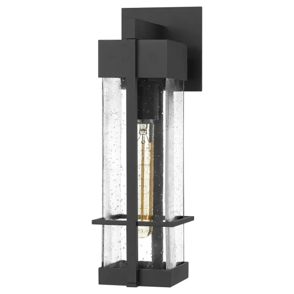 Greet your guests with the luxe style of the Wynn collection. The rectangular silhoutte is framed in an Earth Black finish and was designed with a minimalist in mind. The clear seedy glass panels are easy to maintain and create a warm and welcoming glow when lit.  As a part of our Coastal Armour collection, you can rest assured that this fixture is built to last.