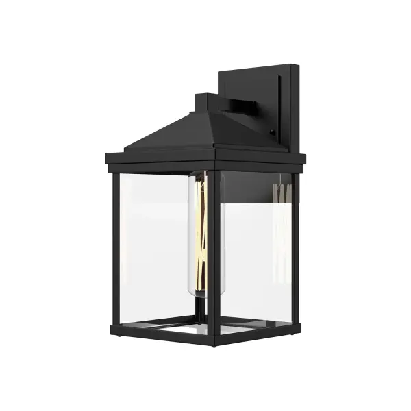 A classic outdoor silhouette, with a touch of West Coast flair? That's our Larchmont Collection. Inspired by the classic outdoor fixtures in LA's historical Spanish homes with a minimalist twist, this collection is sure to create ambiance to your outdoor space. Collection: Larchmont Designer: Alan Pepin Finish: Clear Glass/Textured Black Glass: Clear Glass Width: 7.88" Height: 14.88" Weight: 5.73 lb Extension from Wall: 8.63" Canopy: W4.75" x H6.5" x E0.875" Number of Bulbs: 1 Maximum Wattage: 60.00 W Bulb Type: T Bulb Base: E26 Voltage: 120.00 V Material: Steel + Glass Country of Origin: China Safety Listing: UL Safety Rating: Wet Manufacturer Warranty: 1 Year Spec Sheet Instructions