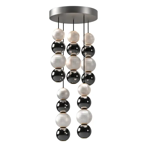 Like gorgeously beaded jewelry, the Onyx collection adds luxury and interest to any design. Meticulously cut spherical shades create glittering beams of illumination throughout the design. Available in Polished Nickel and Natural Brass accompaniments. Collection: Onyx Designer: Ryan Pauly Finish: Polished Nickel Glass: Clear Carved Acrylic Width: 14.63" Height: 15.13" Length: 14.63" Wire: 144" Black Canopy: D13.875" x H2" Maximum Wattage: 45.00 W Light Source: LED Light Output: 3500.00 lm Delivered Lumens: 2525.00 lm Color Temperature: 3000 K CRI: 90 Rated Average Life: 50,000 Voltage: 120.00 V Material: Steel + Acrylic Country of Origin: China Safety Listing: ETL Safety Rating: Dry LED Spec Sheet Instructions