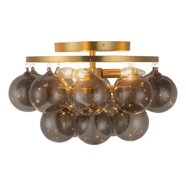Discover the charm of Faye, a whimsical lighting collection designed to inspire and delight. Featuring chandeliers and semi-flush mounts adorned with clusters of clear swirl or sultry smoke glass bubbles, each fixture adds playful elegance and modern artistry to any room. Detailed chain suspensions and a socket-based design offer flexibility to choose the perfect bulbs for your style. Ideal for living rooms, bedrooms, dining areas, and more, Faye creates a captivating glow that elevates everyday spaces. Bulbs required, not included. Collection: Faye Designer: Peyton Fox Finish: Brushed Gold/Smoked Glass Glass: Smoked Glass Width: 17.75" Height: 10.50" Weight: 8.07 lb Canopy: D7.875" x H1" Number of Bulbs: 3 Maximum Wattage: 60.00 W Bulb Base: E12 Candelabra Voltage: 120.00 V Material: Steel + Glass Country of Origin: China Safety Listing: UL Safety Rating: Dry Spec Sheet Instructions