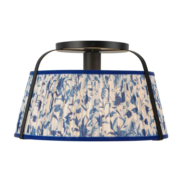The Scout Flush Mount updates traditional pleated linen shades with vibrant patterns in white, green, butter yellow, and warm red. Paired with playful metalwork, this ceiling fixture delivers functional, ambient light while adding personality to bedrooms, hallways, or living spaces. Its compact design suits lower ceilings while maintaining Scout's signature style. Ideal for transitional or eclectic interiors, the Scout Flush Mount brings character, warmth, and charm, transforming everyday spaces into inviting, visually engaging rooms. Collection: Scout Designer: Peyton Fox Finish: Matte Black/Blue Linen Glass: Frosted PC Diffuser Width: 13.25" Height: 8.00" Weight: 4.63 lb Canopy: D6.375" x H0.625" Number of Bulbs: 1 Maximum Wattage: 60.00 W Bulb Type: A19 Bulb Base: E26 Voltage: 120.00 V Material: Steel + Linen Country of Origin: China Safety Listing: UL Safety Rating: Dry Spec Sheet Instructions