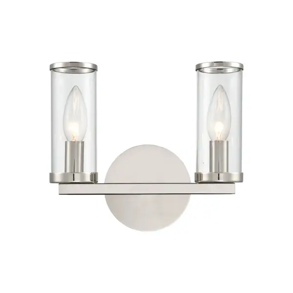 Evoking the elegance of antique candle-holders, Revolve has clear glass tubes accented with metal rings, gathered around a striking chandelier body. Available in multiple finishes, also available as a series of coordinating vanity and wall sconces. Collection: Revolve Sub-Brand: ALORA Finish: Clear Glass/Polished Nickel Glass: Clear Glass Width: 10.38" Height: 8.63" Weight: 2.30 lb Extension from Wall: 4.00" Canopy: D4.75" x E0.875" Number of Bulbs: 2 Maximum Wattage: 60.00 W Bulb Type: Candelabra Bulb Base: E12 Candelabra Light Source: Incandescent Voltage: 120.00 V Material: Steel + Glass Country of Origin: China Safety Listing: UL Safety Rating: Damp ADA Manufacturer Warranty: 1 Year Spec Sheet Instructions