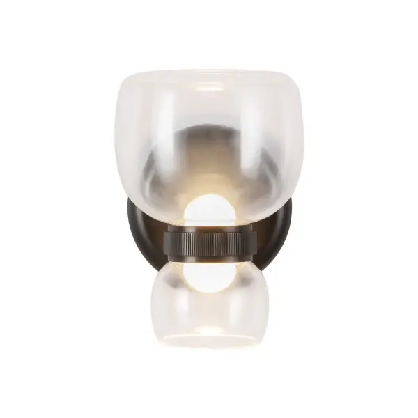 Designed by Elisa Carlucci for Alora Lighting, the Sutton sconce adds a touch of modern glamour to any space. Like the perfect earring completing an outfit, this sconce features a beautifully balanced design with a layered shade and refined metal detailing. Available in multiple finish combinations, Sutton's integrated LED offers five adjustable color temperatures to suit any mood. Perfect for hallways, powder rooms, bedrooms, or kitchens, the Sutton sconce brings effortless sophistication and warm, versatile illumination to your home. Collection: Sutton Designer: Elisa Carlucci Finish: Urban Bronze/Clear Glass Glass: Clear Glass Width: 5.38" Height: 7.63" Weight: 3.97 lb Extension from Wall: 7.25" Canopy: D5" x E1" Maximum Wattage: 11.00 W Light Source: LED Light Output: 890.00 lm Delivered Lumens: 450.00 lm Color Temperature: 2700 K CRI: 90 Rated Average Life: 50,000 Voltage: 120.00 V Material: Steel + Glass Country of Origin: China Safety Listing: ETL Safety Rating: Damp Title 24 LED Spec Sheet Instructions