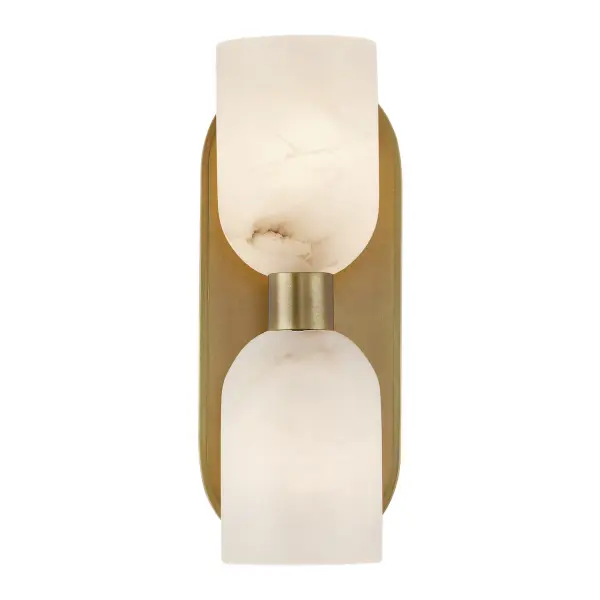 The Lucian collection is inspired by the classic shapes of antique lighting, made modern. Modern touches can be seen in the organically curved backplates and custom designed stems that create the stunning look of the Lucian. Completed with either clear glass or alabaster bowl shades, this collection defines classic elegance. Alabaster boasts distinct variations in both its veining and tone, a unique characteristic of a timeless natural material. No two pieces will look the exact same. Collection: Lucian Designer: Elisa Carlucci Sub-Brand: ALORA Finish: Vintage Brass/Alabaster Glass: Alabaster Shade Width: 3.63" Height: 11.50" Extension from Wall: 5.38" Canopy: W4.625" x H11.125" x E1" Number of Bulbs: 2 Maximum Wattage: 60.00 W Bulb Base: E12 Candelabra Voltage: 120.00 V Material: Steel + Alabaster Country of Origin: China Safety Listing: UL Safety Rating: Damp Manufacturer Warranty: 1 Year Spec Sheet Instructions