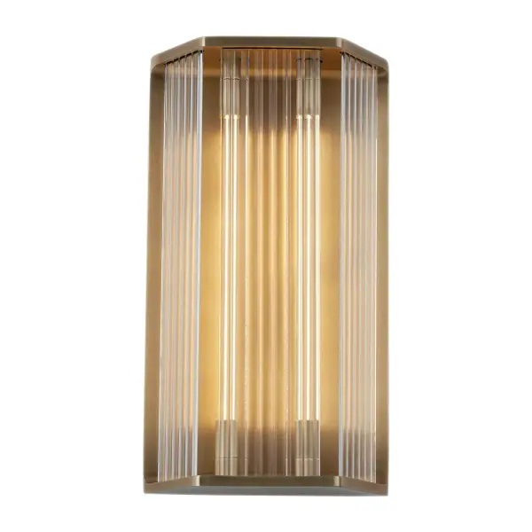 The Sabre collection is truly a modern, architectural piece. Forged metal compliments long tubes of our patented LED filament technology. We allow the lighting to be the star, designing simple elements to compliment the soft, modern glow of the lamp. Available in several configurations, the Sabre creates modern ambiance in any space. Collection: Sabre Designer: Elisa Carlucci Sub-Brand: ALORA Finish: Ribbed Glass/Vintage Brass Glass: Clear Glass Width: 8.63" Height: 15.75" Extension from Wall: 3.88" Maximum Wattage: 14.00 W Bulb Type: LED Light Source: LED Light Output: 1200.00 lm Delivered Lumens: 596.00 lm Color Temperature: 2700 K CRI: 90 Rated Average Life: 50,000 Voltage: 120.00 V Material: Steel + Glass Country of Origin: China Safety Listing: ETL Safety Rating: Damp ADA Title 24 LED Manufacturer Warranty: 5 Years Spec Sheet Instructions