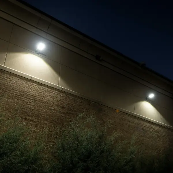 This 1620-lumen solar security light delivers exceptional brightness for outdoor areas without electrical wiring. Features dual operation modes, integrated motion sensor with 140° detection, and programmable timer options for versatile security lighting. - alternate view