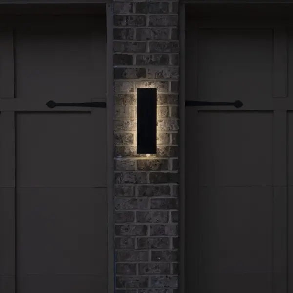 The Eclipse Backlight Solar Wall Light combines sleek architectural design with sustainable solar technology. Its distinctive backlit halo glow and three adjustable color temperatures make it perfect for modern homes seeking wireless outdoor lighting. - alternate view
