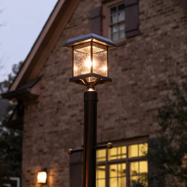 The Aspen Solar Post Light combines sustainable solar technology with charming transitional style. Featuring cast aluminum construction, clear rain glass, and 120-lumen warm white illumination for up to 18 hours, this fixture offers hassle-free outdoor lighting with no wiring required. - alternate view