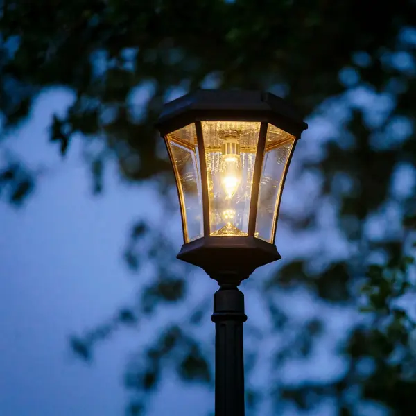 This 90-inch solar lamp post combines 19th-century Victorian elegance with eco-friendly LED technology. The rust-resistant cast aluminum construction and 150-lumen output make it ideal for pathway illumination without electricity costs. - alternate view