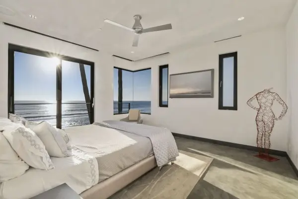 The Altus Flush 52" combines modern design with practical functionality, ideal for rooms with lower ceilings. Its flush mount design maximizes headroom while the 52-inch span provides excellent air circulation for medium to large spaces. - alternate view