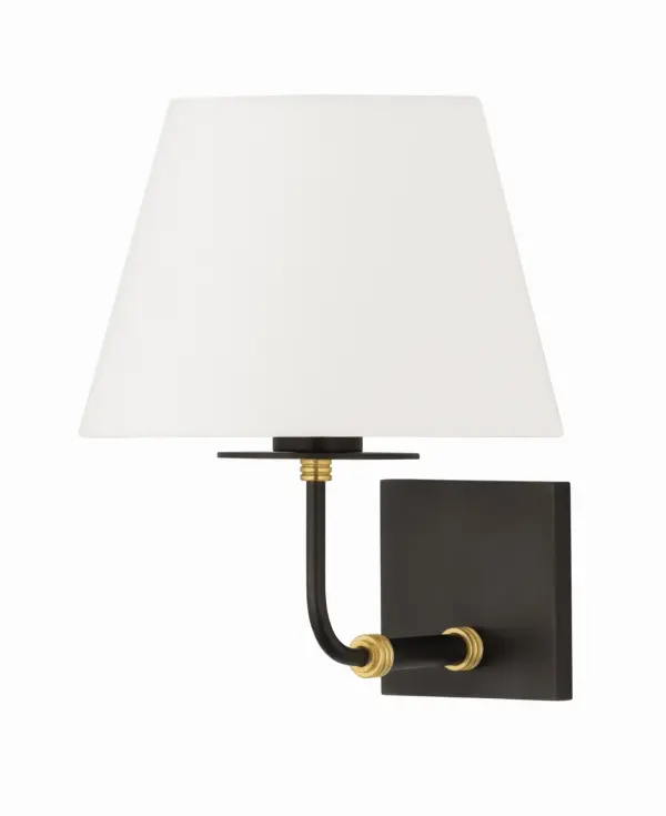 Jamesport's unique sliced cylinder design combines aged brass metal with natural alabaster for a sophisticated look. The alabaster projects beyond the metal housing, creating beautiful light reflection. Perfect for adding architectural interest to transitional spaces.