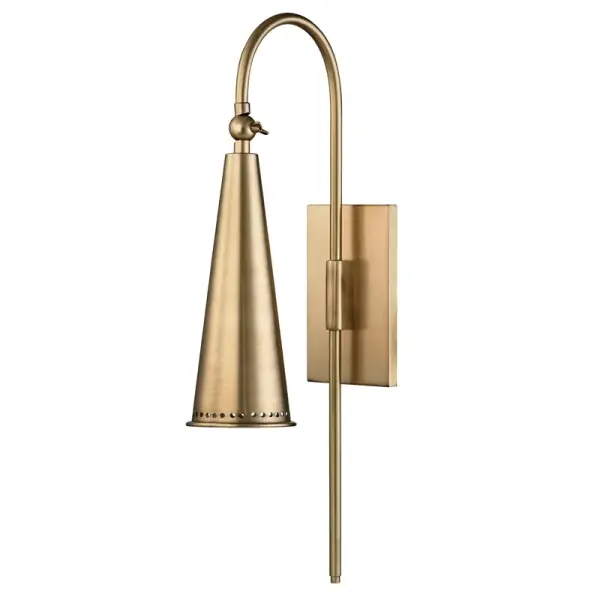 The Alva wall sconce blends mid-century design with modern LED technology. Its adjustable gooseneck arm and perforated metal cone create focused task lighting with vintage appeal, perfect for reading nooks and bedside installations.