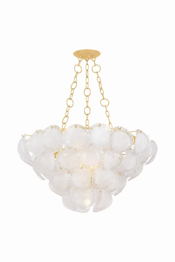 Cedar Hill is a stunning statement piece featuring tiered Blonchino piastre glass panels that curl outward like petals. Its 39-inch diameter and dramatic silhouette make it perfect for grand spaces seeking a luxurious focal point.