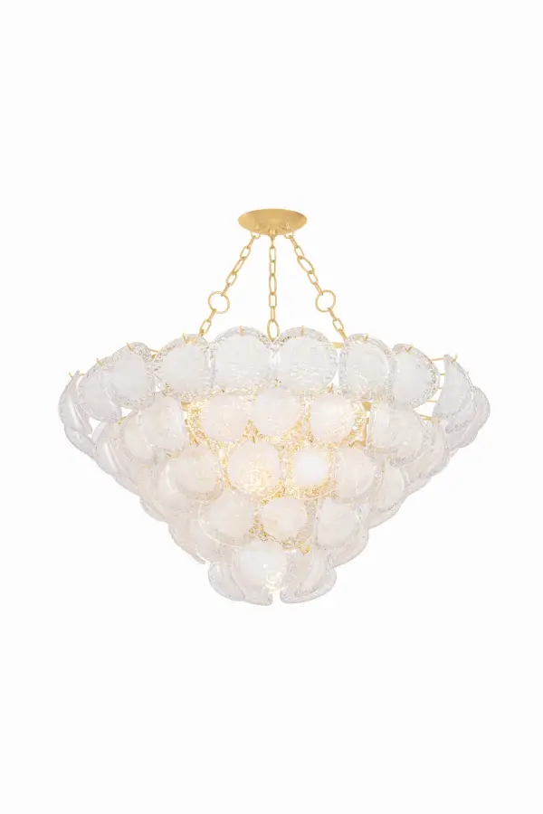 Cedar Hill is a dramatic 17-light chandelier that celebrates bold design with tiered Blonchino piastre glass panels. Each panel curls outward creating dimensional volume that resembles grapes from the side and a blooming rose from below.