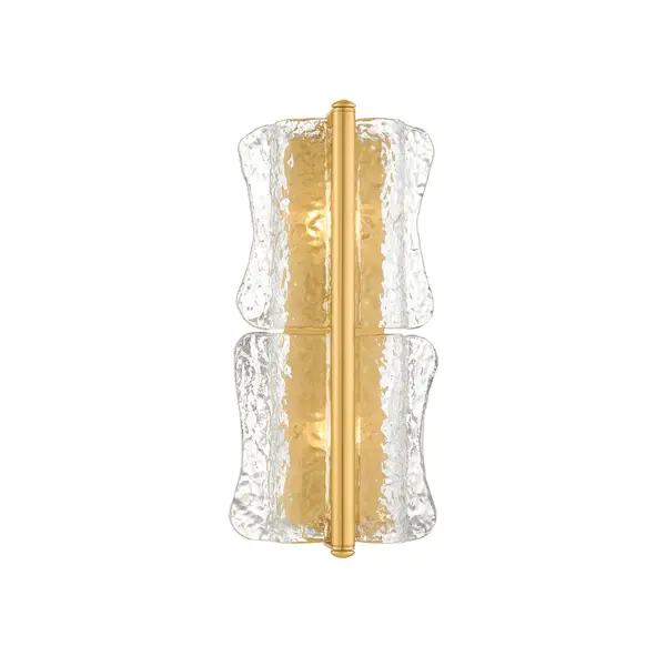 The Fosterdale sconce draws on an anthropomorphic design language reminiscent of Elsa Peretti. Stacked clear piastra glass shades curve into the wall like ice melting around the light source. A slender cylindrical tube finished in Aged Brass secures the glass at the center while shielding the candelabra bulbs from direct view. Thoughtfully scaled for bath and powder rooms, Fosterdale can be oriented vertically or horizontally as needed. Available with 1-4 lights. Collection: Fosterdale Designer: Hudson Valley Lighting Finish: Aged Brass Glass: Clear Optic Width: 8.25" Height: 18.75" Weight: 9.13 lb Extension from Wall: 4.00" Canopy: 4.25"x16.50" Number of Bulbs: 2 Maximum Wattage: 10.00 W Bulb Type: B11 Bulb Base: E12 Candelabra Voltage: 120.00 V Material: Glass Country of Origin: VN Safety Listing: UL/cUL Safety Rating: Damp ADA Manufacturer Warranty: 1 Year Limited Manufacturer Spec Sheet Instructions