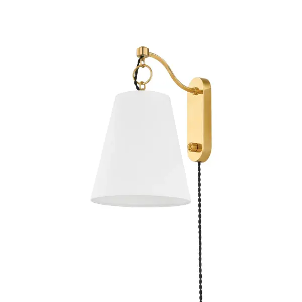 The Joan wall sconce combines nautical charm with practical functionality. Its vintage miner's lamp silhouette features a white linen shade suspended from an elegant swan neck arm, while the integrated full-range dimmer offers convenient lighting control.