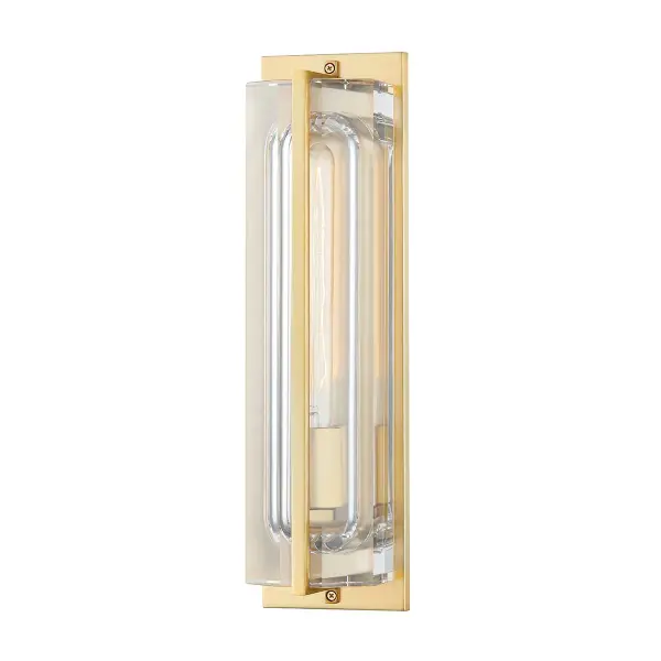 The Hawkins wall sconce combines classic proportions with contemporary clean lines. Its aged brass finish and clear glass shade create warm, inviting illumination perfect for bathrooms and hallways.