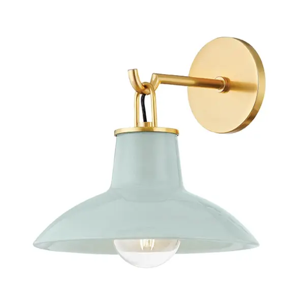 This refined wall sconce pairs aged brass metalwork with a distinctive moss crackle ceramic shade, creating a sophisticated focal point. The artisanal finish adds texture and visual interest while maintaining versatility across design styles.