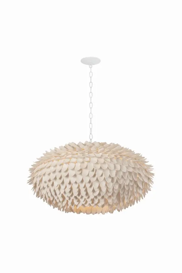 The Alsen pendant reimagines iconic artichoke design with natural coco shells, creating a voluminous, textured focal point. Its 36.5-inch diameter makes a bold statement in large spaces while the white plaster finish maintains coastal elegance.
