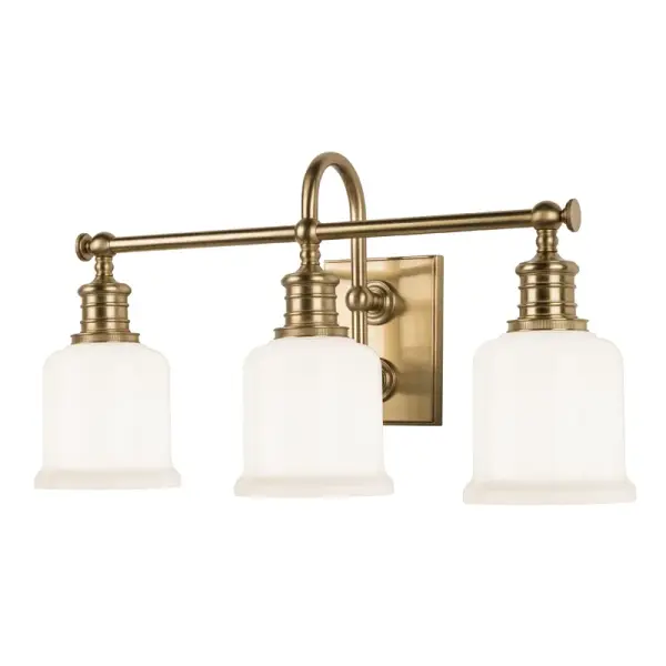 The Keswick combines industrial gooseneck arms with refined bell-shaped glass shades for a versatile vintage aesthetic. Double-mounted arms ensure durability while cast swivels and knurled details add authentic period character.