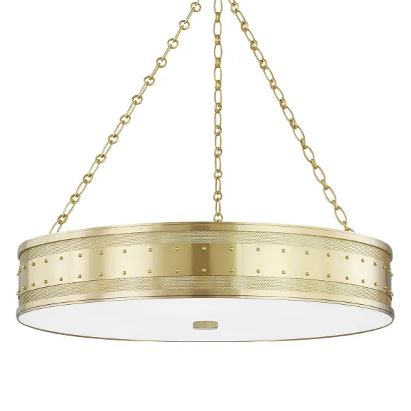 The Gaines chandelier combines transitional styling with contemporary clean lines. Its 30-inch linear profile and aged brass finish bring warmth and sophistication to dining spaces and kitchen islands.