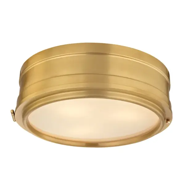 The Rye flush mount delivers understated elegance with its aged brass finish and compact 14-inch profile. Perfect for spaces with limited ceiling clearance, it provides ambient lighting without visual clutter.