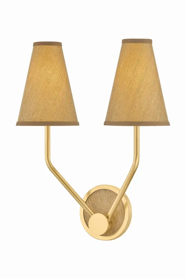The Buskirk sconce reimagines Victorian design with handwoven grasscloth shades and aged brass accents. Its natural materials and artisanal texture bring warmth to small spaces, while the dual-light configuration provides ample illumination.