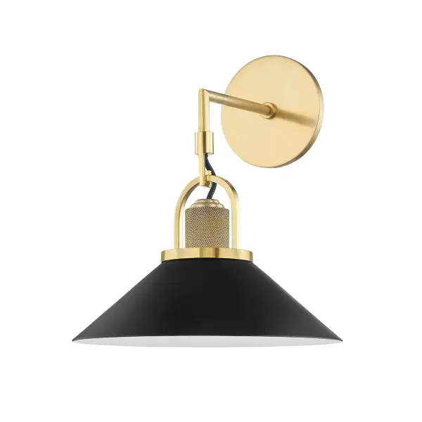 This single-light wall sconce combines aged brass and black finishes for a refined, versatile look. The mixed-metal aesthetic works beautifully in both traditional and contemporary settings, making it ideal for bathrooms, hallways, and bedrooms.