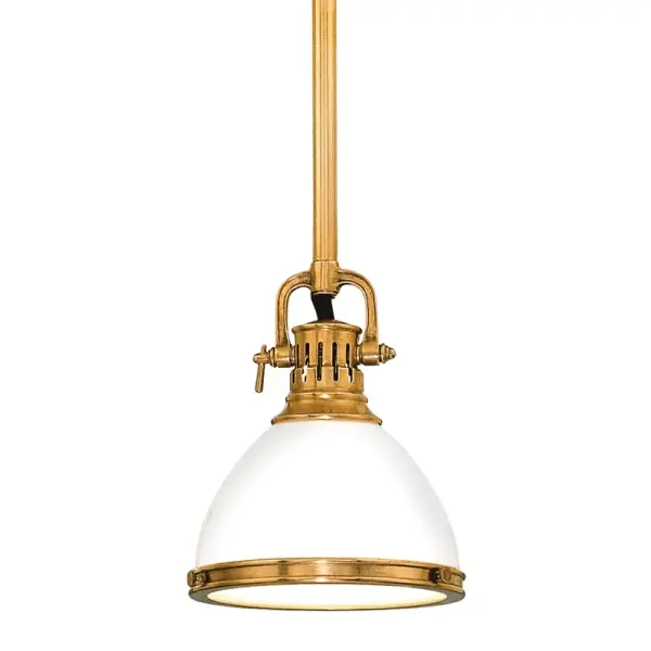 The Randolph pendant combines classic brass warmth with a compact 7-inch profile, making it ideal for smaller spaces or clustered installations. The opal glass shade provides soft, diffused light while the aged brass finish adds vintage character.