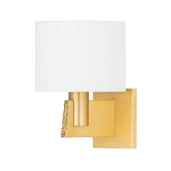 The Brampton sconce elevates any space with its unique textural aged brass finish that mimics natural stone, paired beautifully with a soft linen shade. Perfect for creating warm, sophisticated ambiance in bedrooms and hallways.