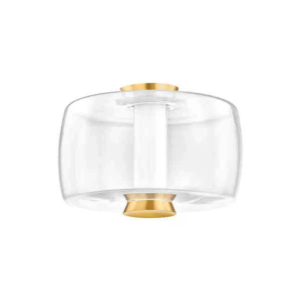 The Beau flush mount combines delicate clear glass with warm aged brass for a sophisticated, contemporary look. Its integrated LED provides efficient, high-quality light perfect for modern interiors seeking understated elegance.