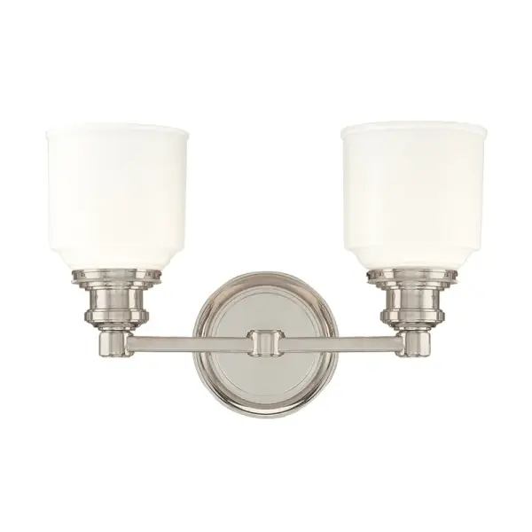 The Windham bath bracket delivers traditional elegance with its polished nickel finish and opal glass shades. At 14.25 inches wide, it's perfectly proportioned for standard vanities while providing ample task lighting for grooming.