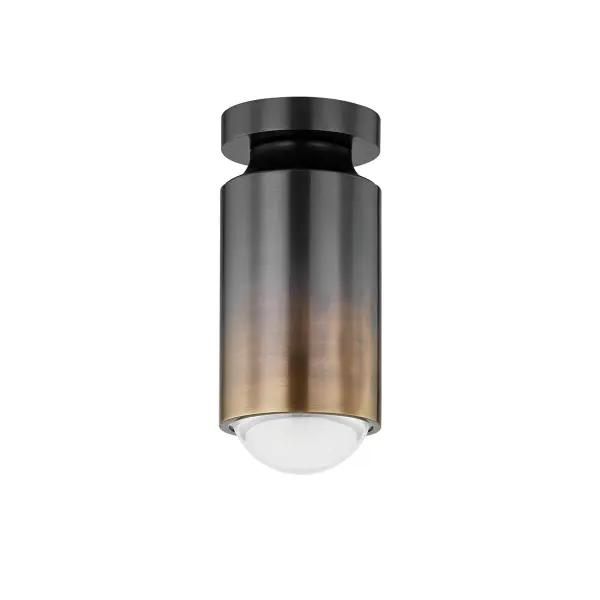 The Whately flush mount delivers mid-century modern style in a compact 4.75-inch profile. Its gradient brass finish and domed glass lens create visual interest while providing functional illumination for smaller spaces.