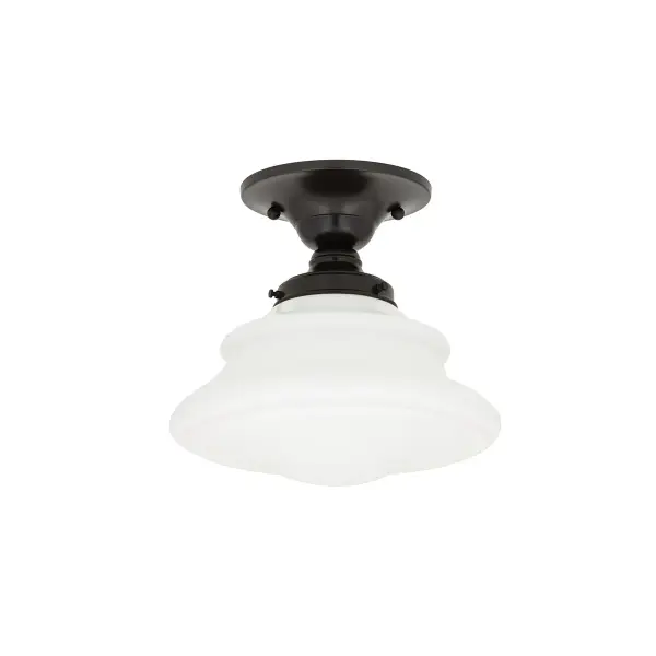The Petersburg brings vintage schoolhouse charm through mouth-blown opal glass crafted using traditional paced mold techniques. Its compact 9.5-inch profile and warm Old Bronze finish make it ideal for smaller spaces needing ambient lighting with character.