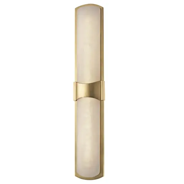 The Valencia LED wall sconce combines contemporary design with warm aged brass finish. Its 26-inch height makes it ideal for flanking mirrors or creating vertical visual interest. Integrated LED technology delivers 640 lumens with excellent color rendering.
