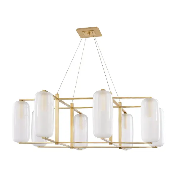 The Pebble chandelier delivers dramatic scale and refined elegance with eight lights arranged in a 48-inch linear span. The aged brass finish and clear etched glass shades create a warm, inviting glow perfect for large dining spaces.