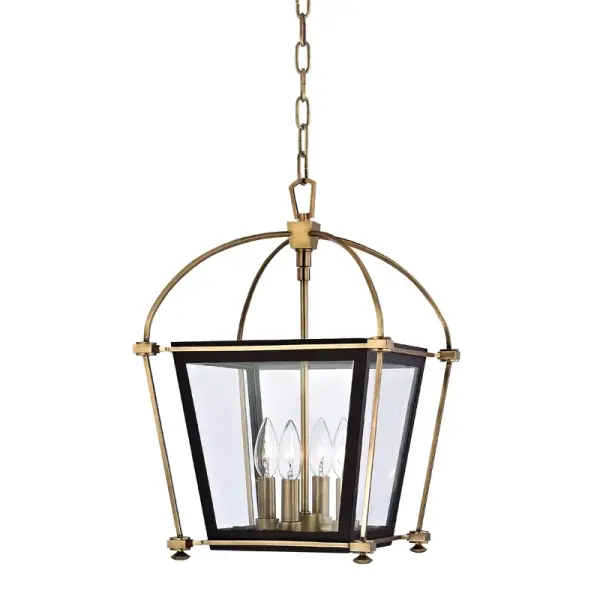 The Hollis lantern brings traditional elegance with its four-light configuration and warm aged brass finish. Its 12.75" square profile and clear glass panels create beautiful ambient lighting for entryways and dining spaces.