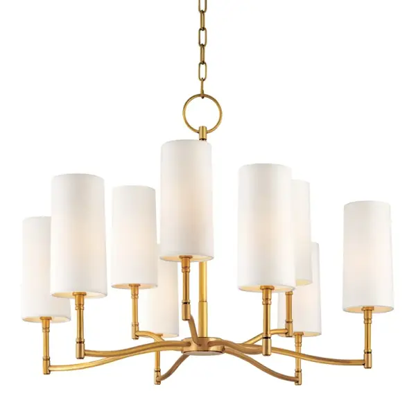 The Dillon chandelier combines transitional elegance with contemporary clean lines. Its aged brass finish and faux silk shades create warm, diffused lighting perfect for dining spaces and kitchen islands.